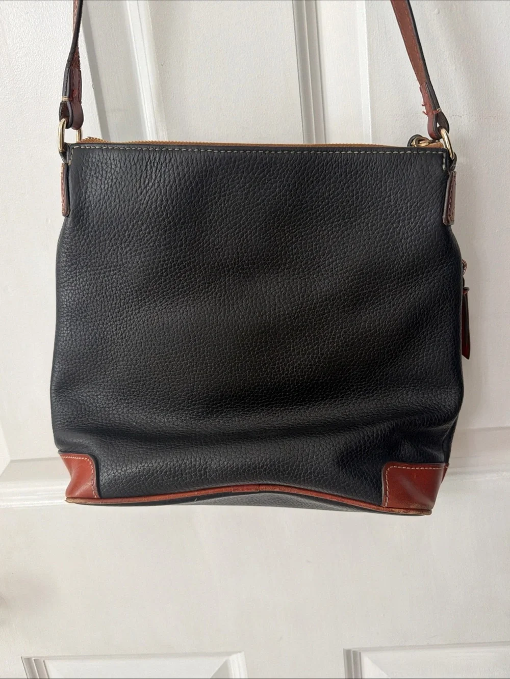Dooney & Bourke Black Pebbled Leather Crossbody Bag with Brown Trim